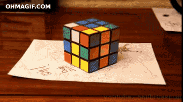 http://s5.picofile.com/file/8134006192/rubiks_cube_cool_optical_illusion_16019.gif