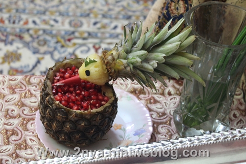 تزیین آناناس بشکل طوطی به عنوان ظرف انار